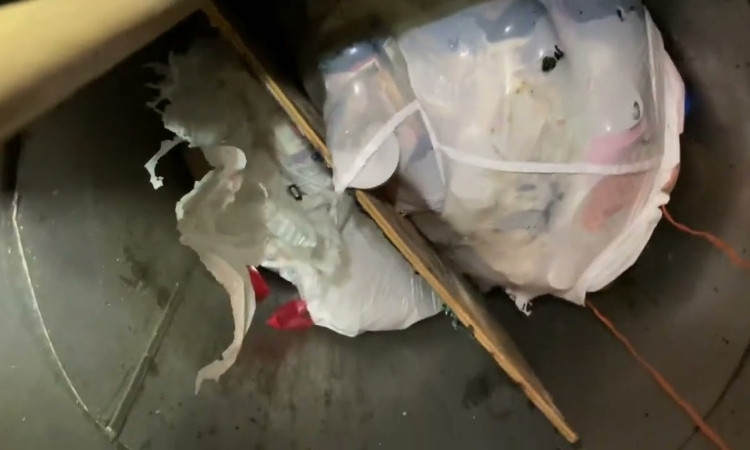 trash chute unclogging