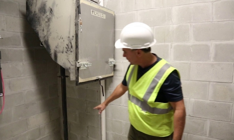 repairing a commercial rubbish chute